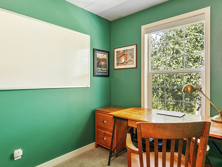 Upstairs office, or itty bitty 4th bedroom. Faces out the back of the house.