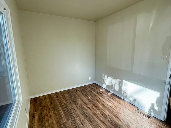 Extra room can be used for office, playroom, studio or storage space.