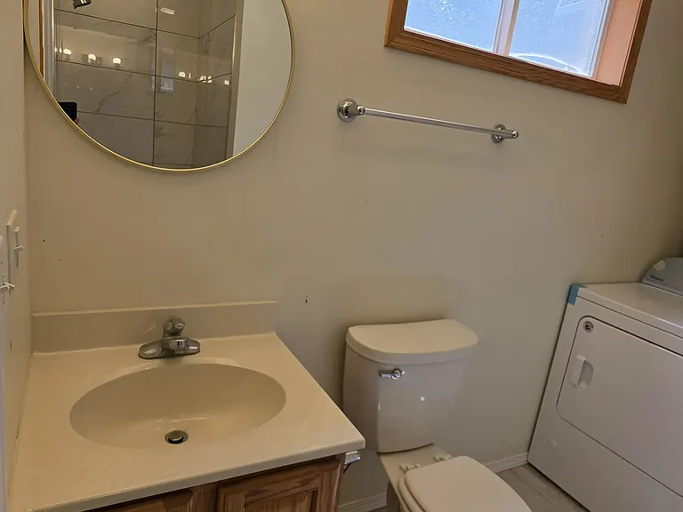 3/4 bathroom/laundry room on lower level