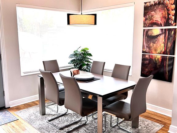dining area open to kitchen and living room kitchen view