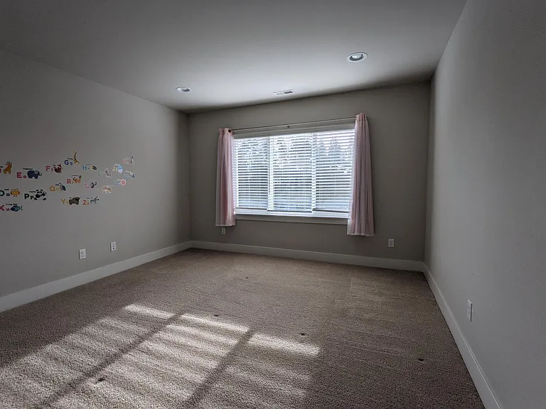 Upstairs Loft (curtains can be included if needed). Stickers on wall will be removed.