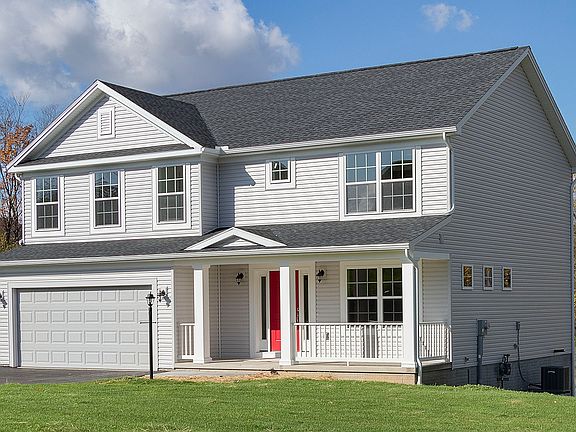 S A Homes Greenwood A floorplan - front exterior view - two story home with front porch, vinyl sidin