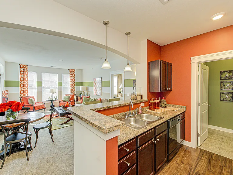 Our open-concept floor plans feature bright living rooms, a breakfast bar, and in-unit laundry _ the perfect layout for everyday living in West Lafayette.