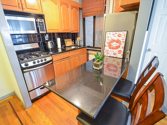 5th image of 403 W 57th St APT 4A