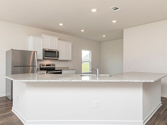 This kitchen is chef-ready with stainless steel appliances