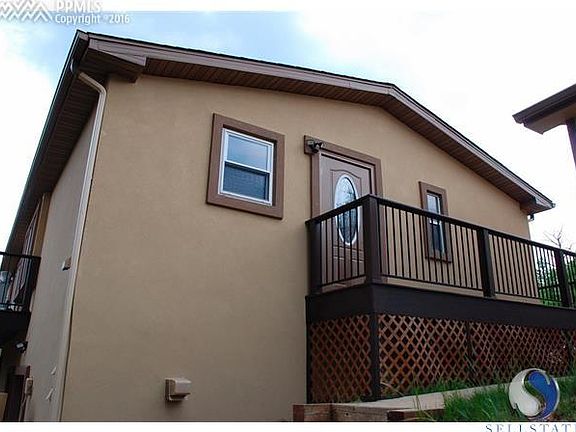Side entrance with new deck and doors