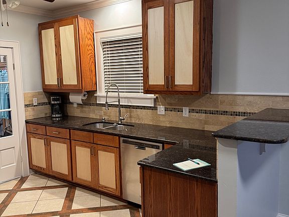Custom 48" tall solid oak upper cabinets, custom solid oak lower cabinets too