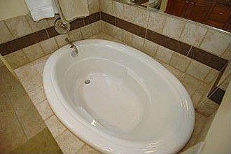 Large China Bath, Travertine tiles