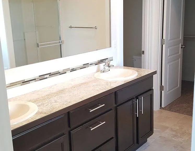 Master bath with tub, shower, separate toilet and walk-in closet