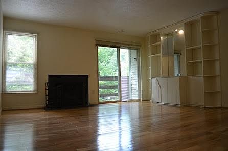 Living Room . View of Fireplace and deck/ balcony