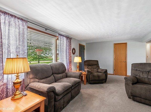 Abundant windows light up this room! Entry closet a plus!