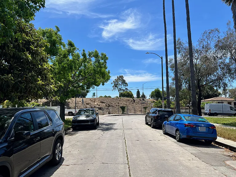 Street view facing south toward I-10 with home on left.