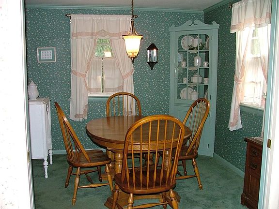 Dining Room w/ built-in corner cabinet