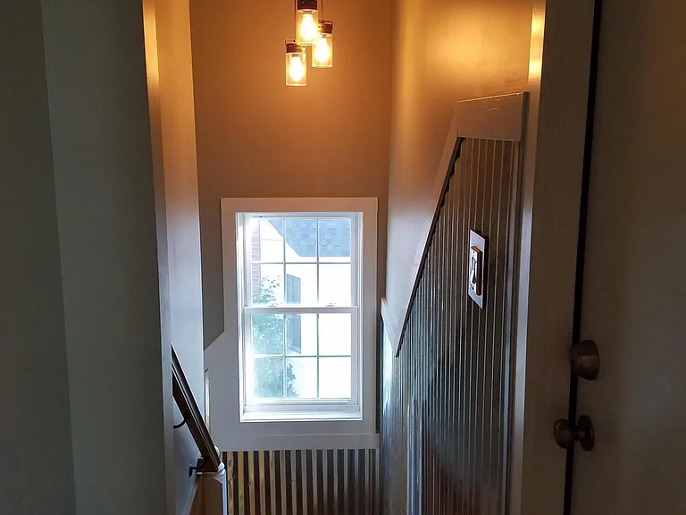Going down the steps leaving your apartment.