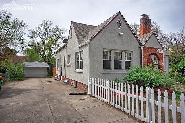 Main entrance to basement unit on driveway side of home