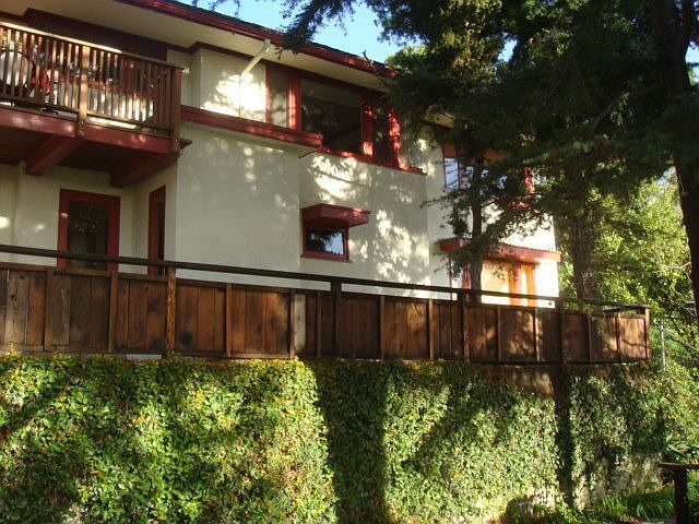 2-story, lots of trees