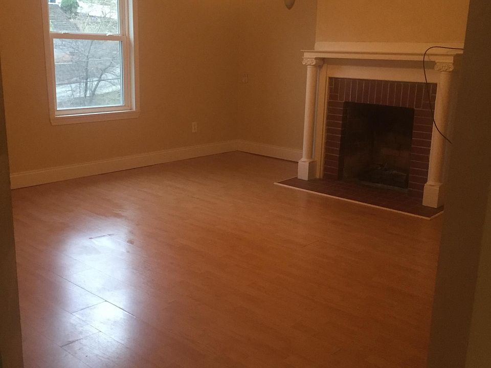 Living room- hardwoods & fireplace