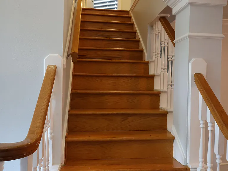 Oak stairs to the second floor.