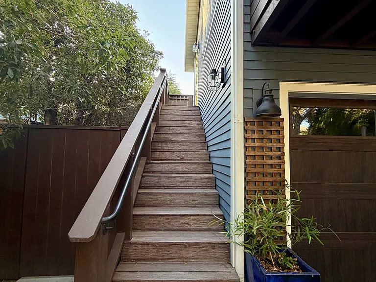 Entrance stairway to upstairs studio.