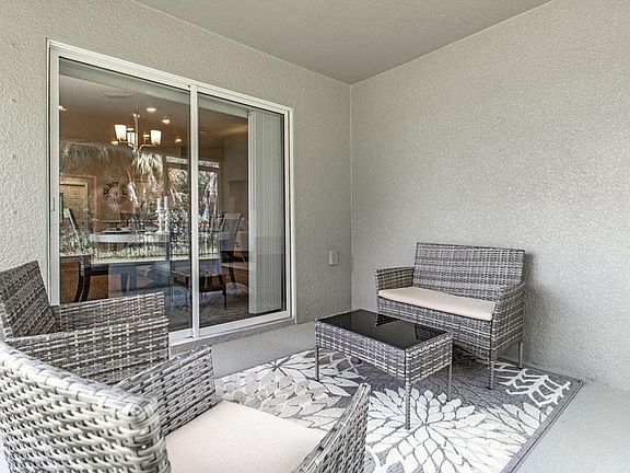 Raychel Lanai - New home for sale in Auburndale, FL. Photo showcases a home with similar finishes.