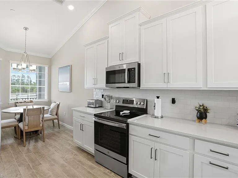 11851 Venetian Lagoon Dr #202 — Photo 7