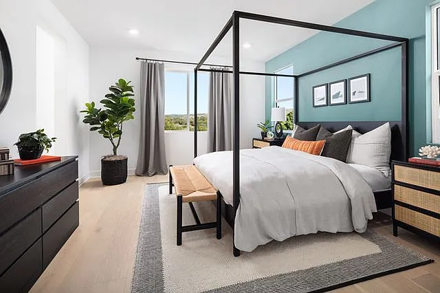 Master Bed Room with Poster Bed and abundant sun light