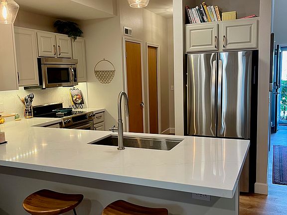 Kitchen 1 - first door in back is water heater, second is pantry