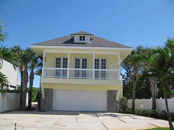 Captain's guest quarter above 2-car garage facing river