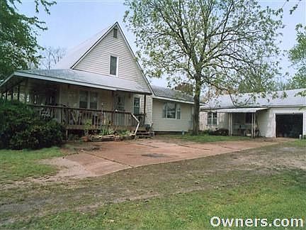 exterior with garage in backgroun