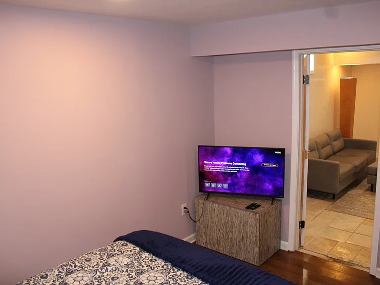 Private bed includes TV and stand