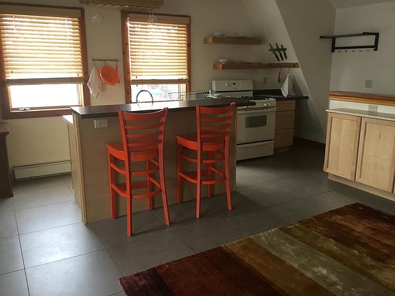 Kitchen, with counter and stools
