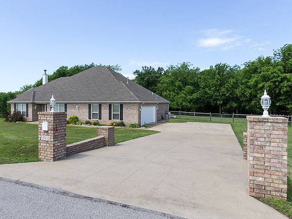 View from the street...this subdivision requires brick header walls, side entry garages...makes for overall neighborhood curb appeal