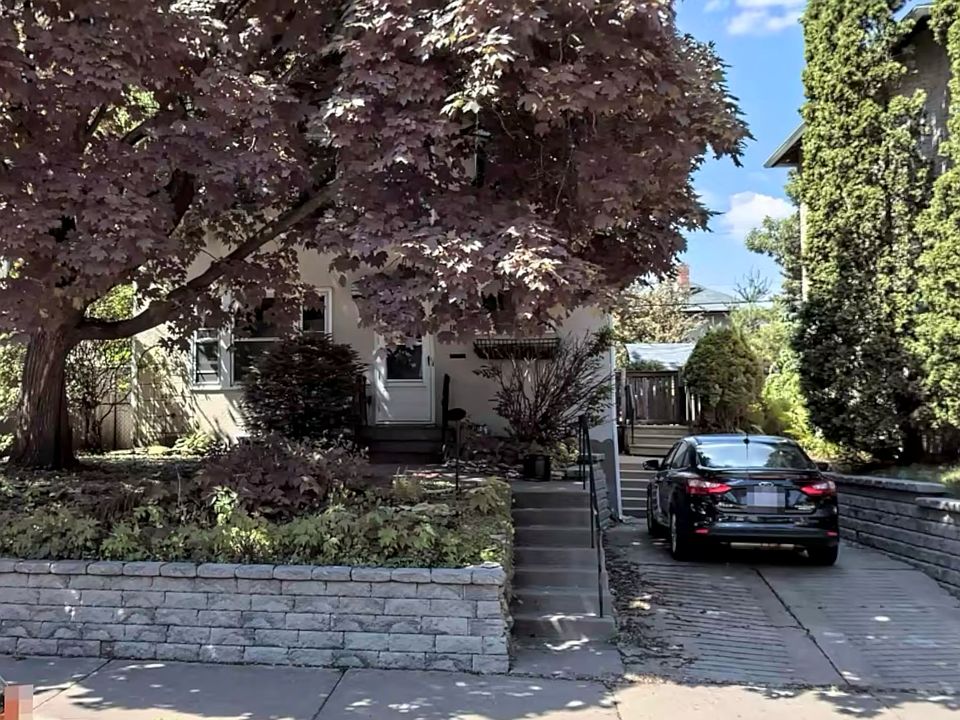 Front of House
Off street parking
Plenty of on-street permit-free parking as well. 
No garage only a large shed in back. Yard has plants and mulch vs. grass