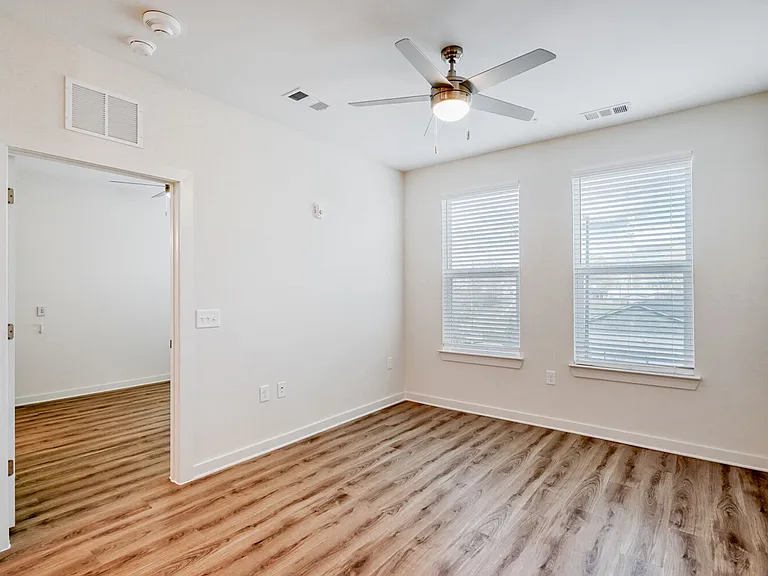 Unit Living Room with Entrance to Bedroom
