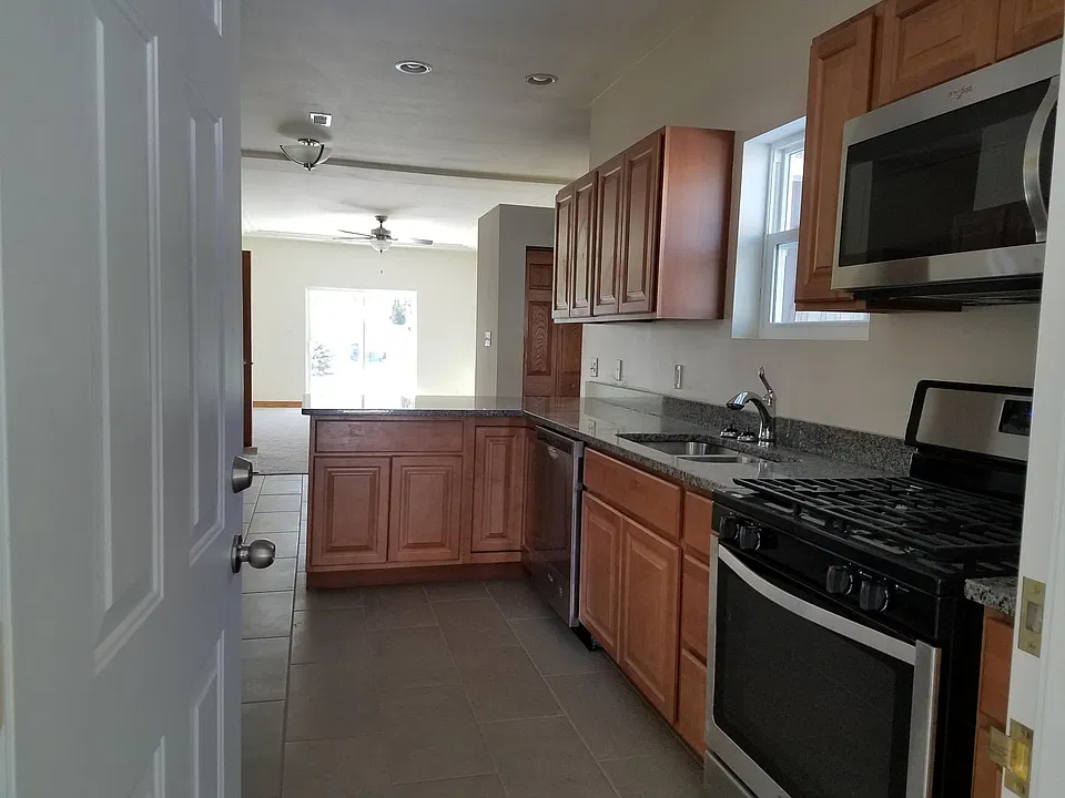 Stove, Above Range Microwave & Dishwasher Included.
