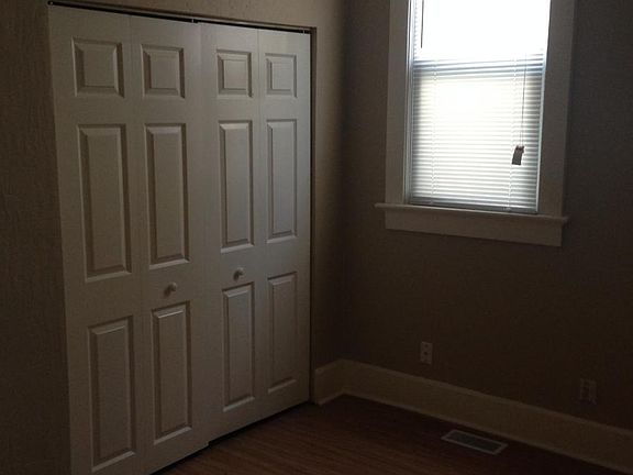 Main level bedroom. vinyl plank flooring