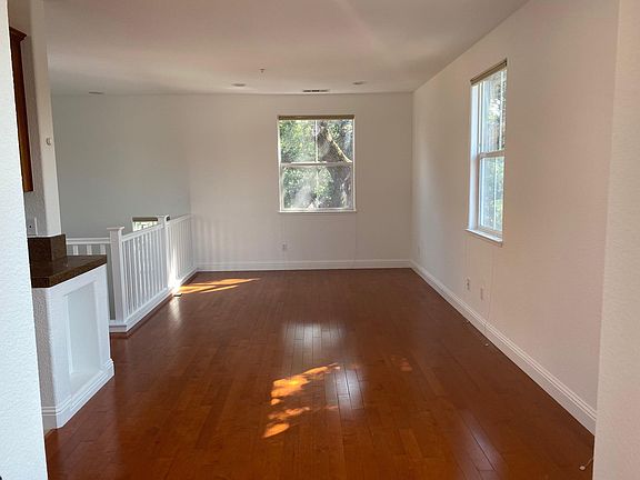 Well-lit living room on top floor