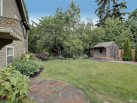 Lovely fully fenced backyard with shed