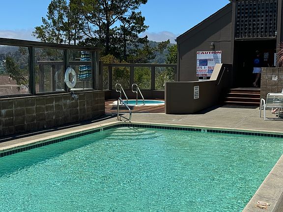 Pool, hot tub, locker room with showers & dry sauna