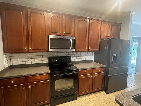 Kitchen with new Fridge