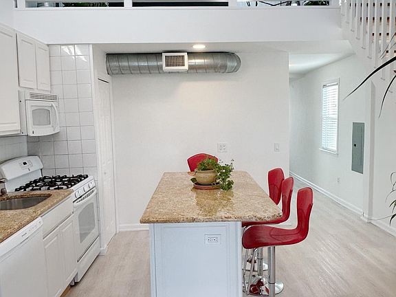 Eat In Kitchen, Stairs Lead To Living Rm Loft