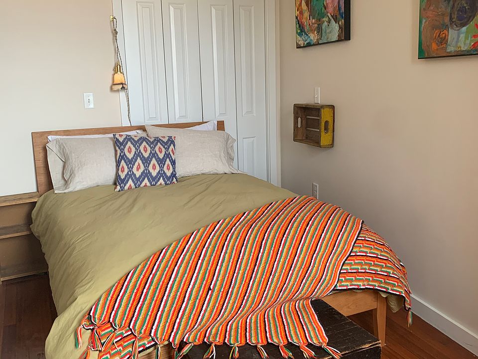 Beautifully furnished bedroom with closet.