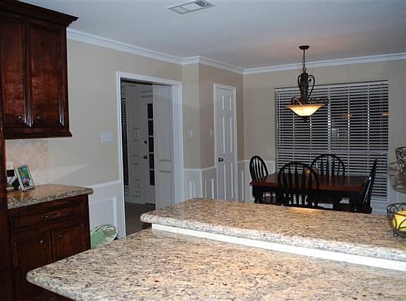 HUGE Kitchen that leads right to breakfast room with this GREAT BAR!