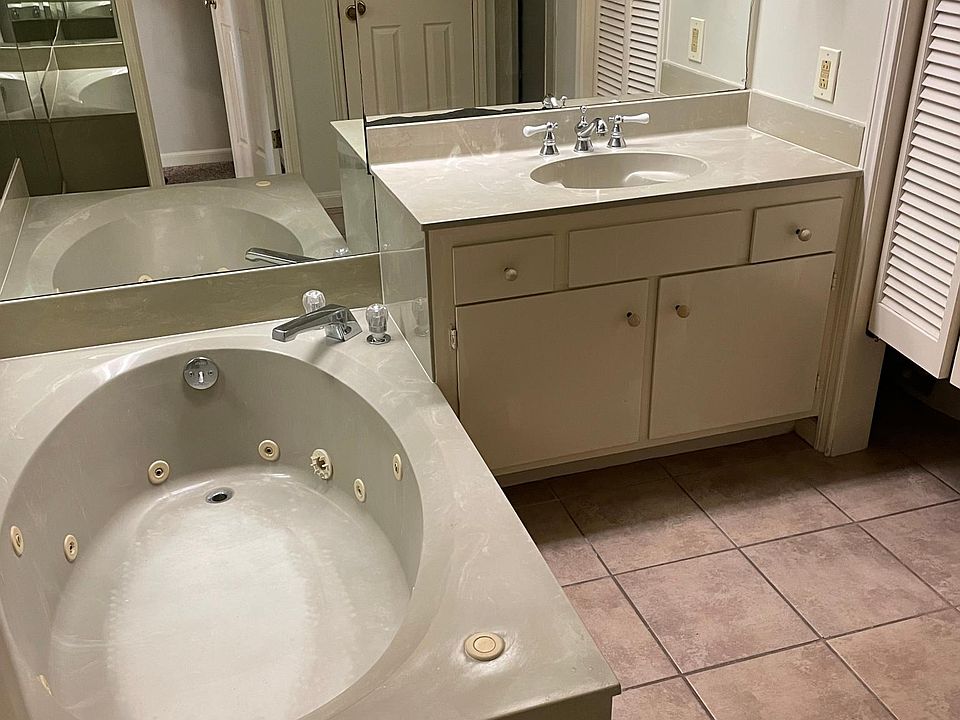 Bath includes garden tub and shower