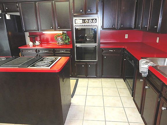 WOW...the kitchen has all the I wants...endless storage...double oven - jenn air stove with grill - you'll be twice the cook in half the time!