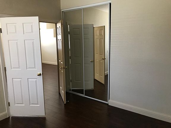 Bedroom 4 (Optional Office/Den) doors open to great room.