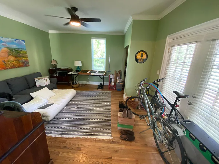 Main floor bedroom or office! Note french doors leading out to private deck!