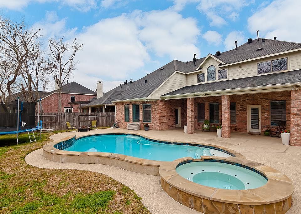 Dream Backyard features your own pool and hot tub
