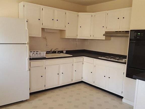 Kitchen with new gas range and oven