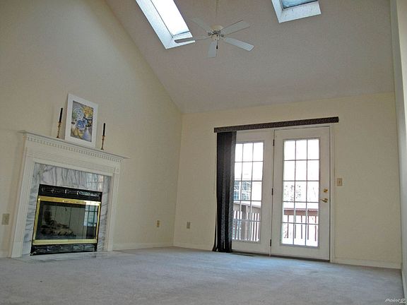 The cathedral ceiling, skylights, and atrium doors to the 10'x10' deck add great natural light.